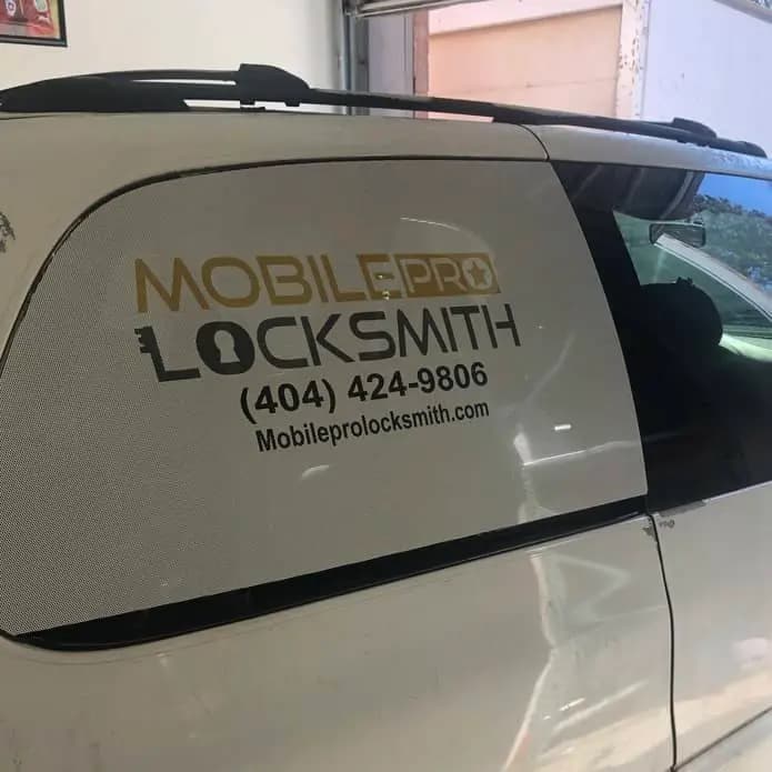Mobile Pro Locksmith 24/7 mobile locksmith vehicle in Lawrenceville, GA Mobile Pro Locksmith vehicle with branded locksmith service wrap